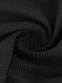 Close-up of black fabric with a textured pattern