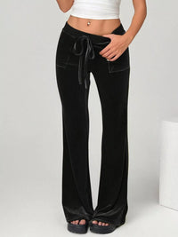 Black wide-leg pants with a drawstring waist on a white background