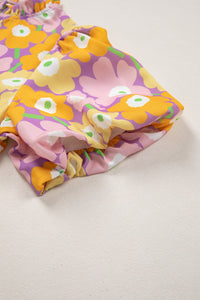 Colorful floral-patterned fabric on a light background