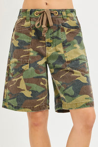 Camouflage shorts on a white background