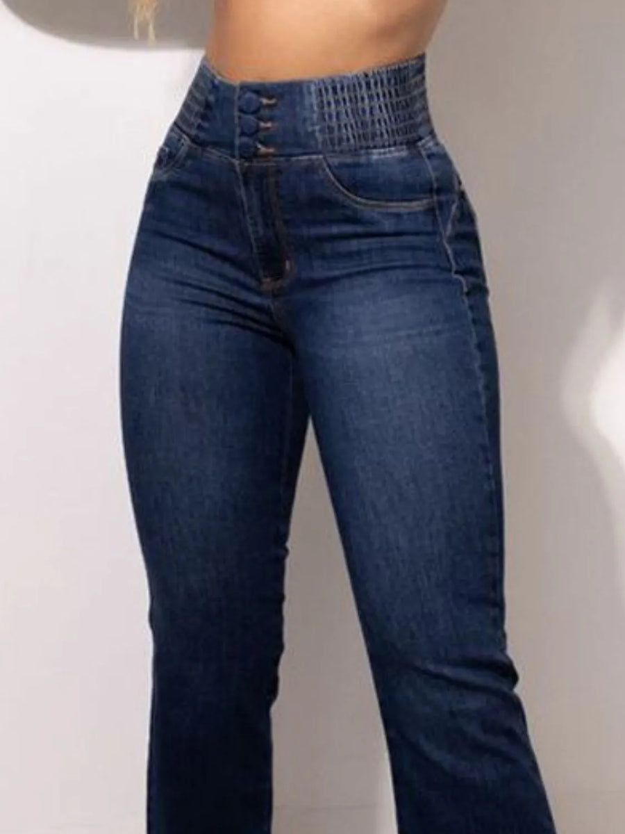 Blue jeans on a plain background
