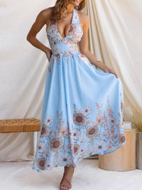 Woman wearing a floral dress with a white background