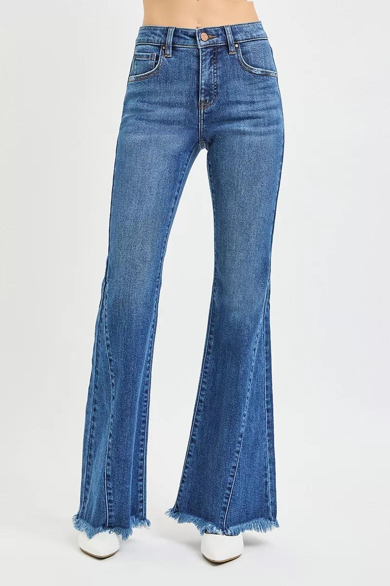 Blue flared jeans on a white background