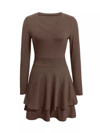 Brown dress with long sleeves on a white background