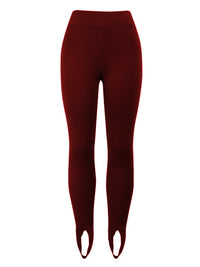 Maroon leggings with cut-out design on a white background