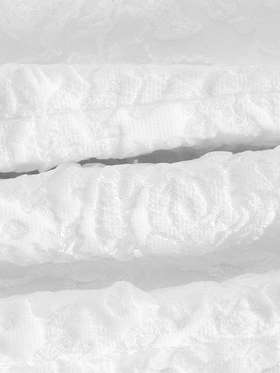 Close-up of snow with visible texture and patterns