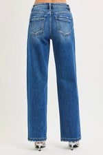 Blue jeans displayed on a white background