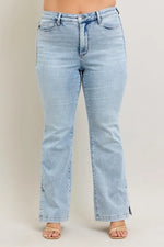 Light blue jeans on a plain background