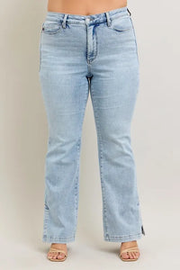 Light blue jeans on a plain background