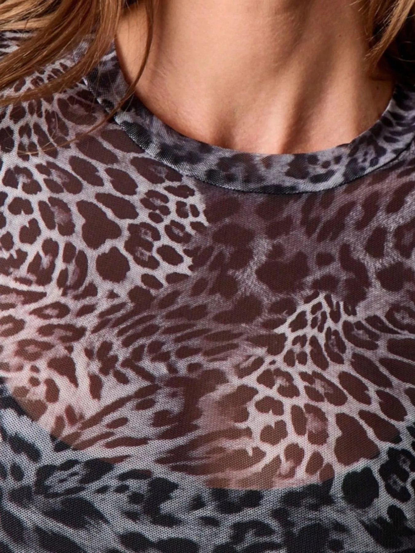 Close-up of a leopard print fabric with a blurred background