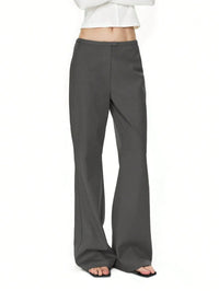 Gray wide-leg pants worn by a person on a white background