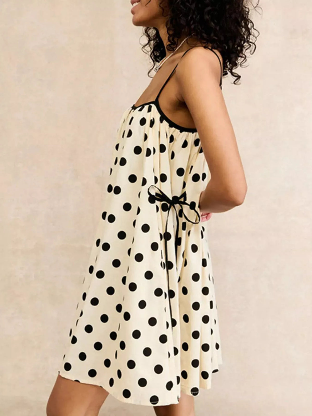 Left side view of Polka Dot Spaghetti Strap Mini Dress