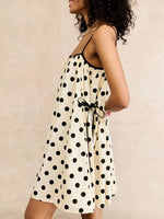 Left side view of Polka Dot Spaghetti Strap Mini Dress