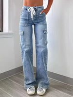 Person wearing light blue cargo jeans with a white background