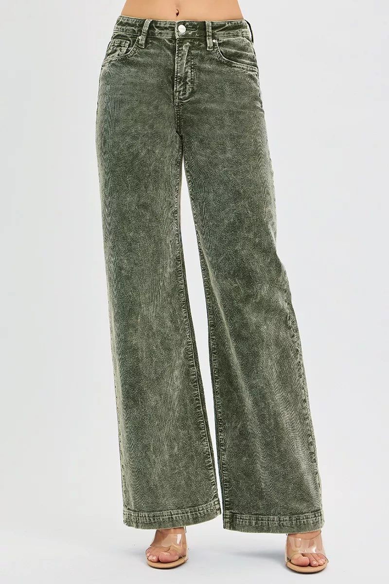 Green wide-leg jeans on a white background