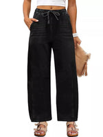 Black wide-leg pants worn by a person on a white background