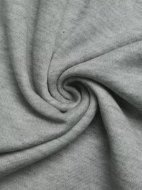 Close-up of gray fabric with a swirl pattern