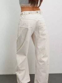 Back view of white patched jeans
