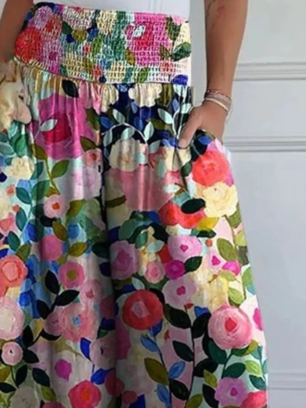 Colorful floral dress with a white background