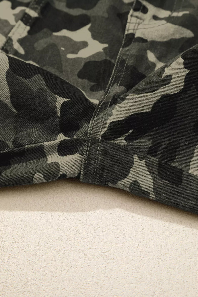 Camouflage-patterned fabric on a beige background