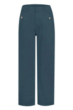 Teal pants with gold buttons on a white background