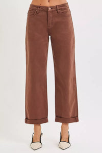 Brown wide-leg jeans on a white background