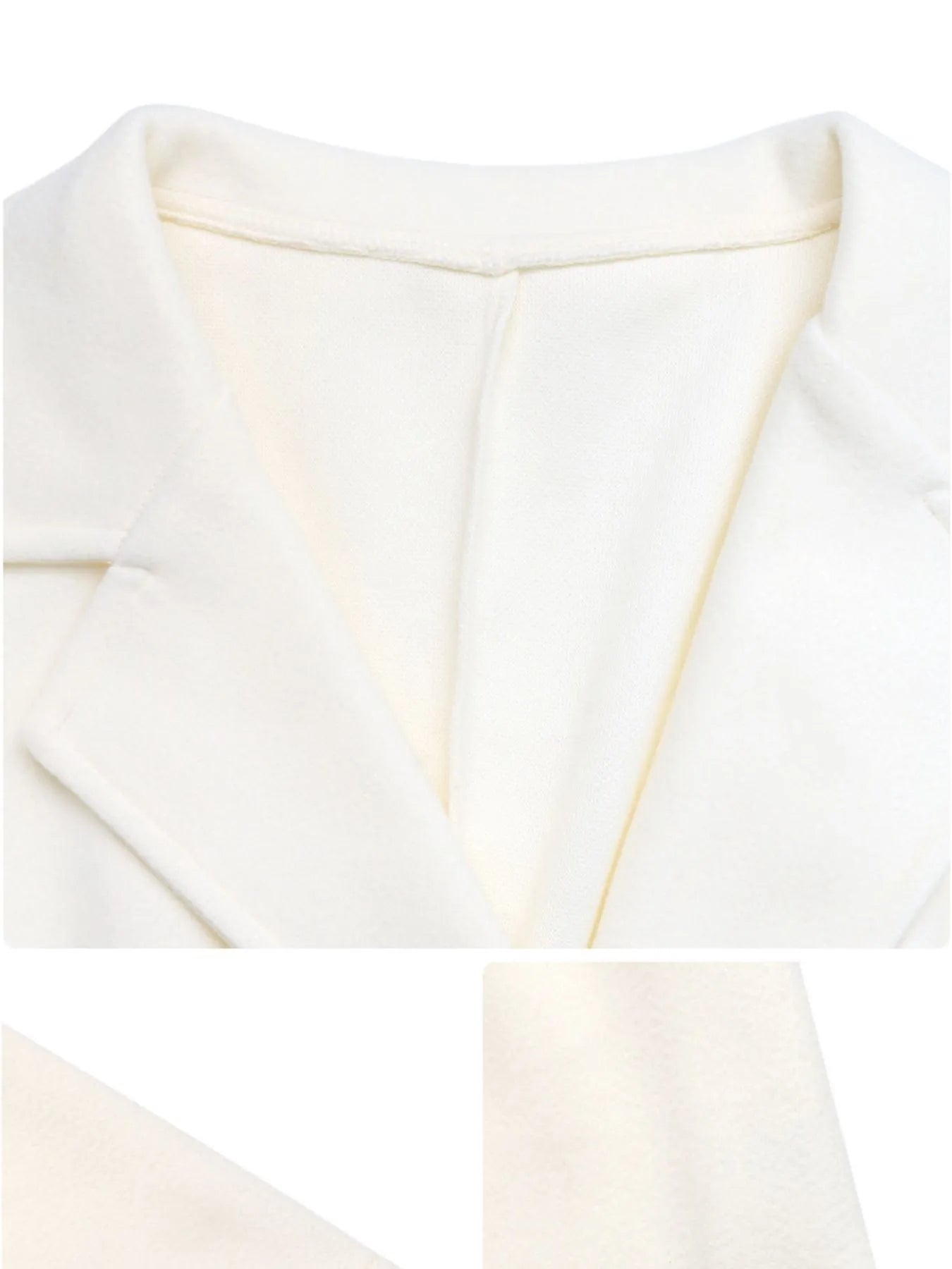 Close-up of a white fabric texture with a subtle pattern.