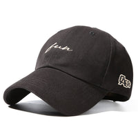 Black cap with white text and logo on a white background