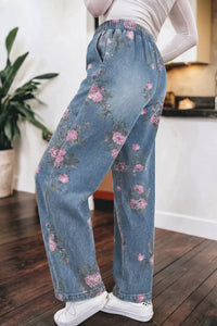 Person wearing floral jeans in a kitchen setting