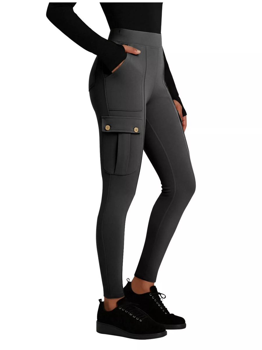 Dark gray leggings with pockets worn by a person on a white background