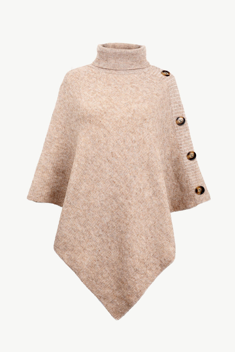 Beige poncho with button details on a white background