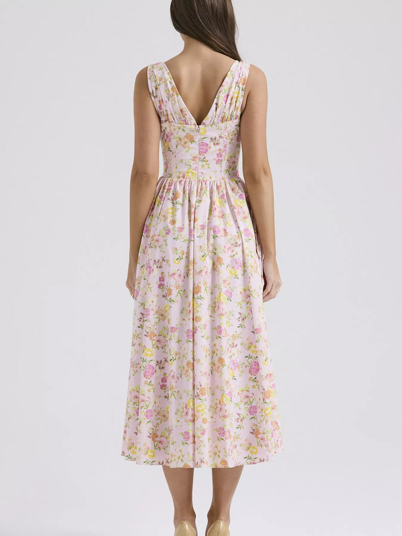 Woman wearing a floral dress on a white background