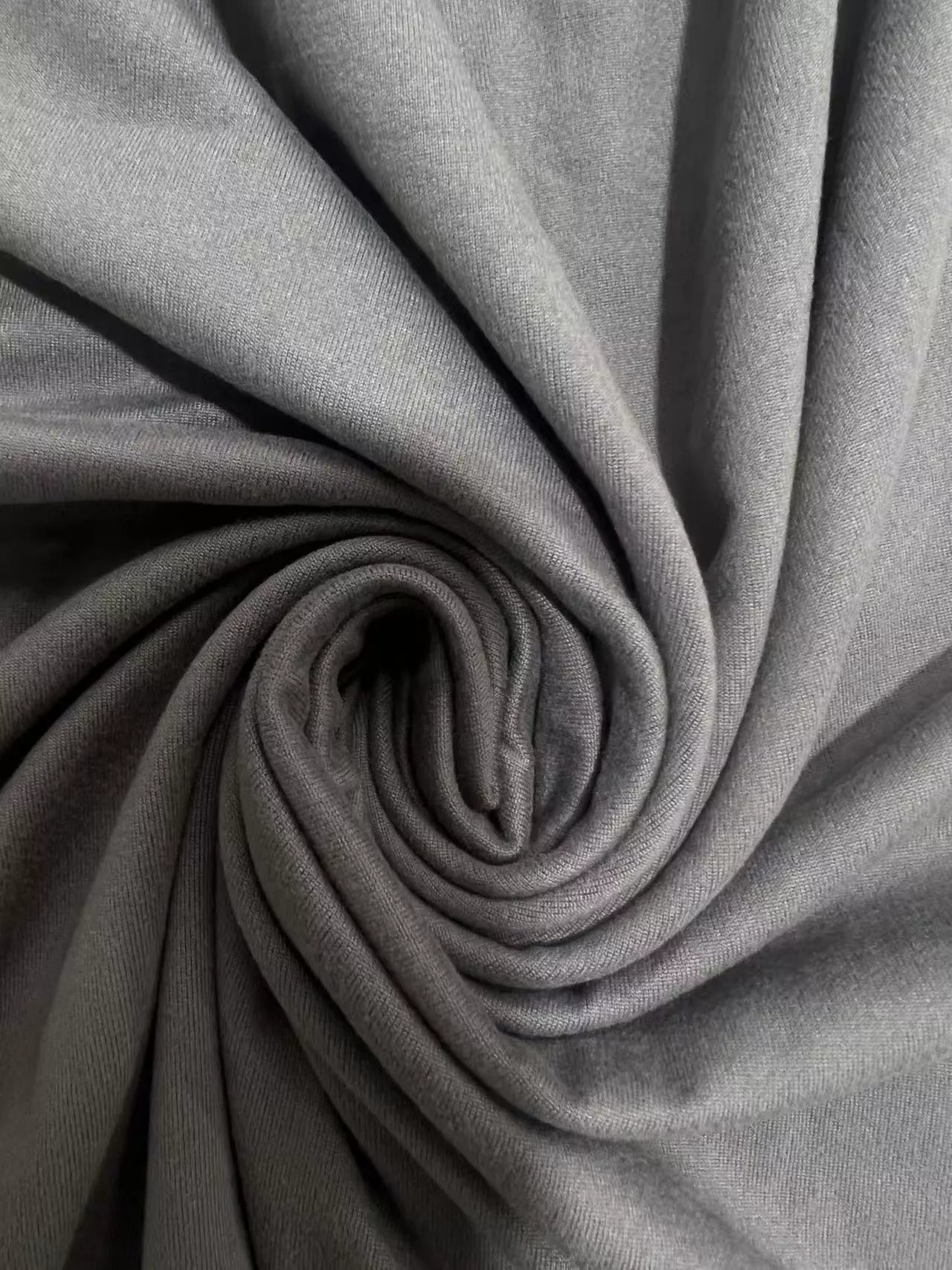 Close-up of gray fabric with folds