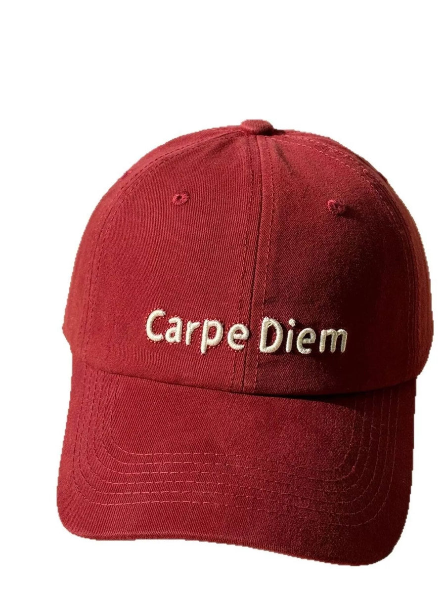Red cap with 'Carpe Diem' text on a white background