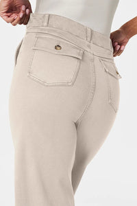 Beige pants with a visible brand logo on a white background