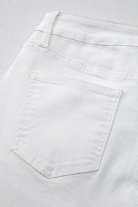 Close-up of a white pocket on light gray fabric