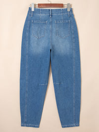 Blue jeans on a beige background