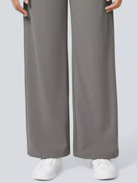 Gray wide-leg pants worn by a person on a light gray background