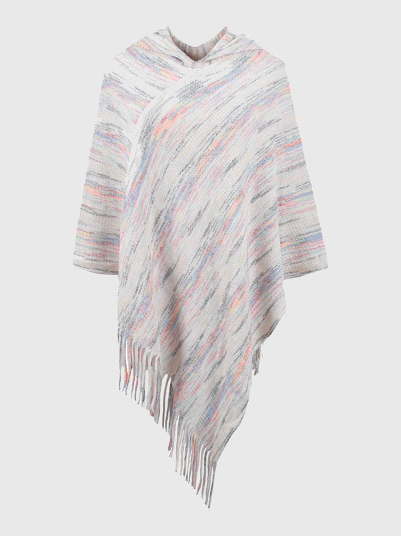 Striped poncho with fringes on a white background
