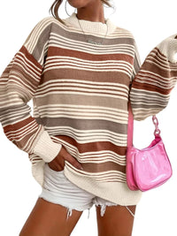 Person wearing a striped sweater and shorts with a pink handbag on a white background