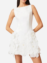 White dress with floral details on a white background