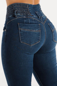 Blue jeans with a focus on the back pocket and waistband.