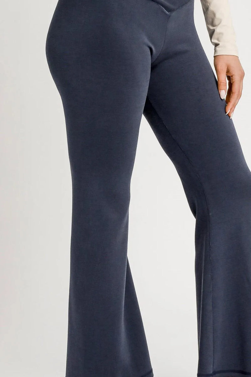 Navy blue pants on a light gray background