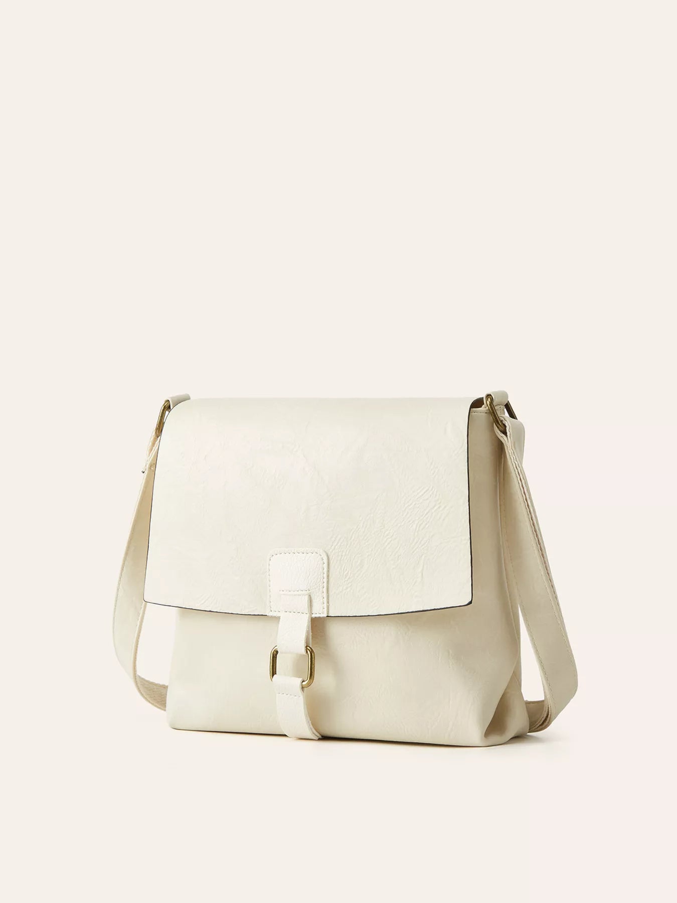 Beige shoulder bag on a light beige background
