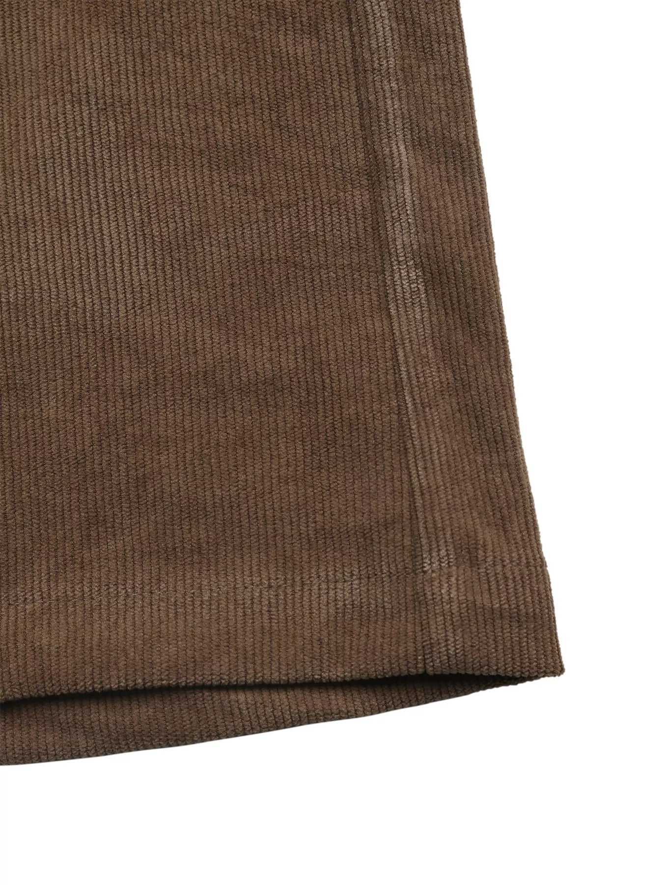 Brown fabric with a textured pattern on a white background