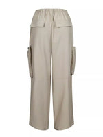 A pair of wide-leg cargo pants in a light beige or khaki color, featuring an elastic waistband, flap cargo pockets on the sides, and utility pockets on the upper thighs, shown against a plain white background.