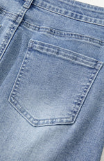 close up view of back pocket on Distressed Raw Hem Heart Denim Skirt