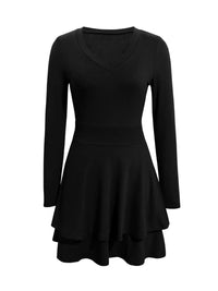 Black dress with long sleeves on a white background