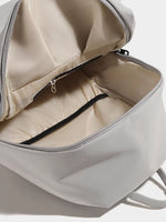 Gray backpack with open front compartment on a light gray background