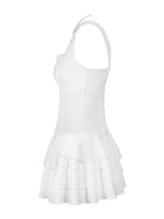 White dress with ruffled skirt on a white background
